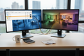 Dual-monitor setup showing a zone-by-zone budget spreadsheet on the left and a color-matched 3D office render on the right, with a calculator and vendor quote on the desk
